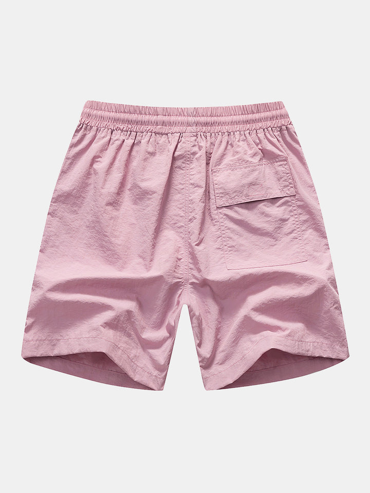 CONJUNTO Camisa de botones y pantalones cortos de baño