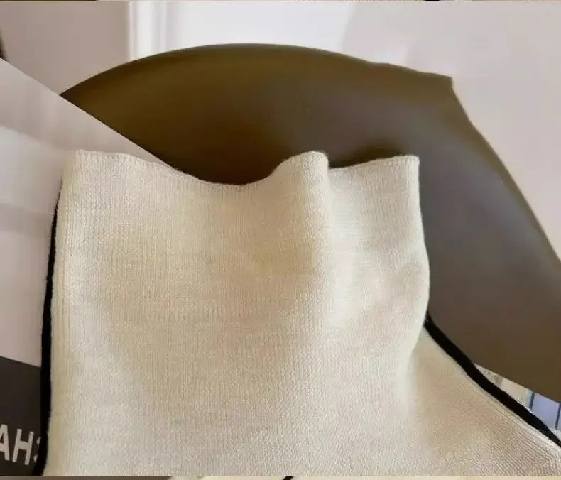 SUÉTER DE CUELLO ALTO LARGO