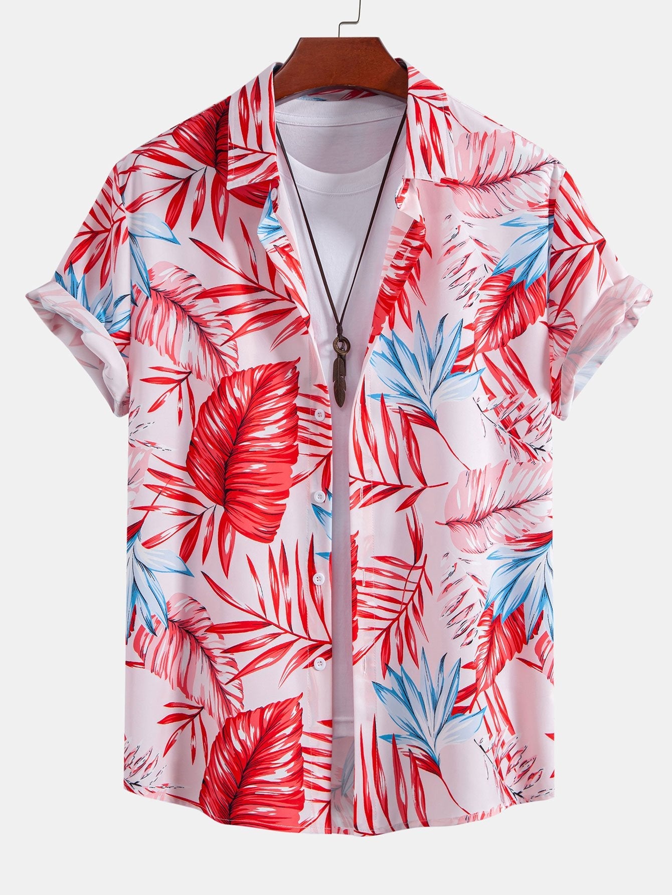 Camisa de botones con estampado tropical y pantalones cortos de baño