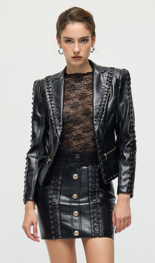CONJUNTO CHAQUETA Y MINIFALDA DE CUERO