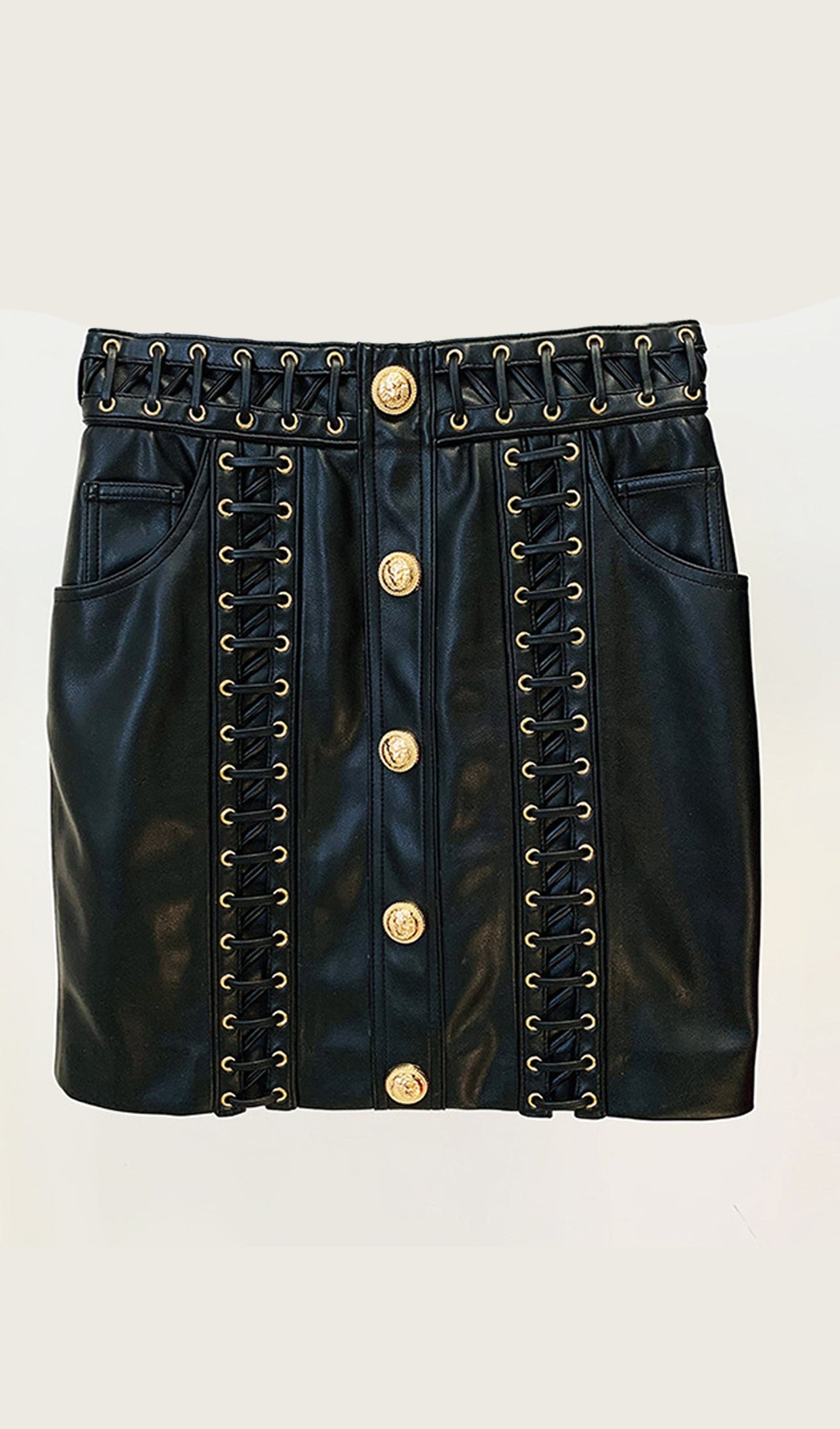 CONJUNTO CHAQUETA Y MINIFALDA DE CUERO