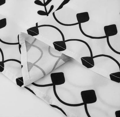 Camilla – Conjunto estampado con bordado negro