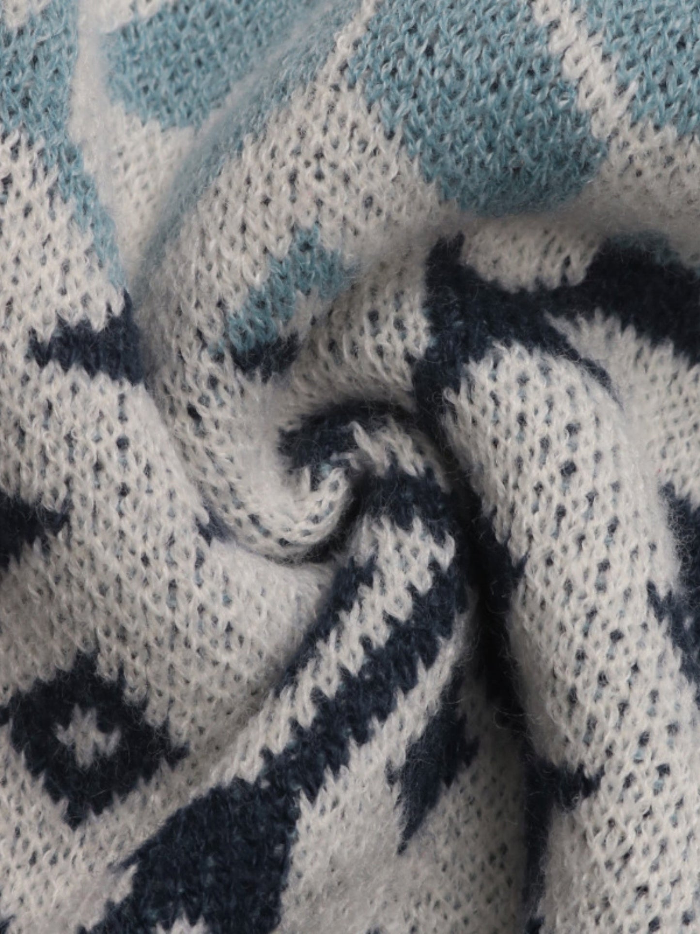 JERSEY AZUL GEOMÉTRICO CON COPOS DE NIEVE