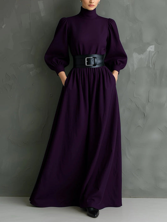 VESTIDO LARGO DE CUELLO ALTO CON CINTURÓN EN TONO VIOLETA OSCURO