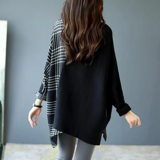 SUÉTER ASIMÉTRICO DE CUELLO ALTO A CUADROS